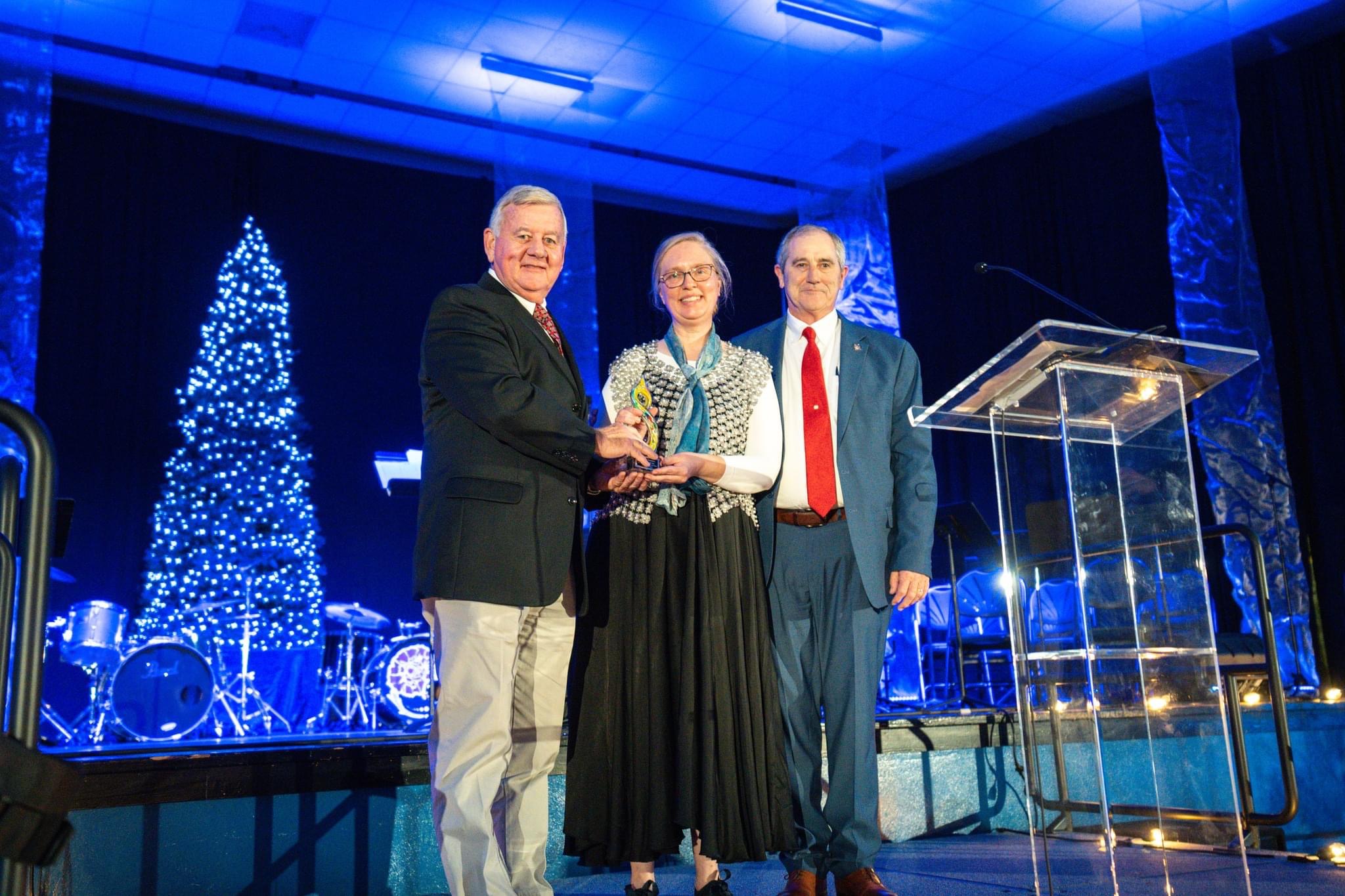 Pictured (middle) is Sonya Clemons, NACC 2022 Alumna of the Year.